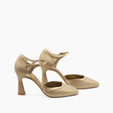Zapatos dorados con tacón